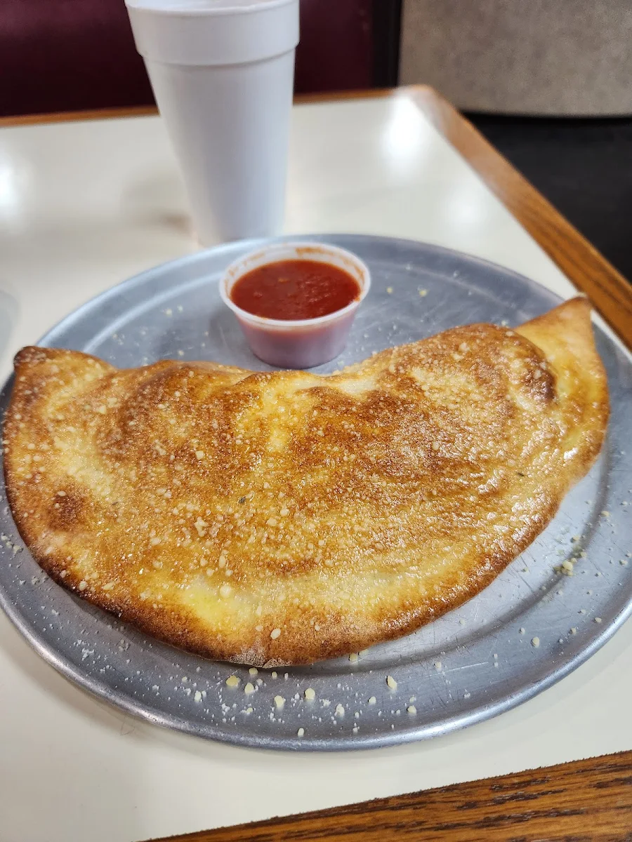 Garlic Cheese Bread Calzone & Soda Stromboli & Soda