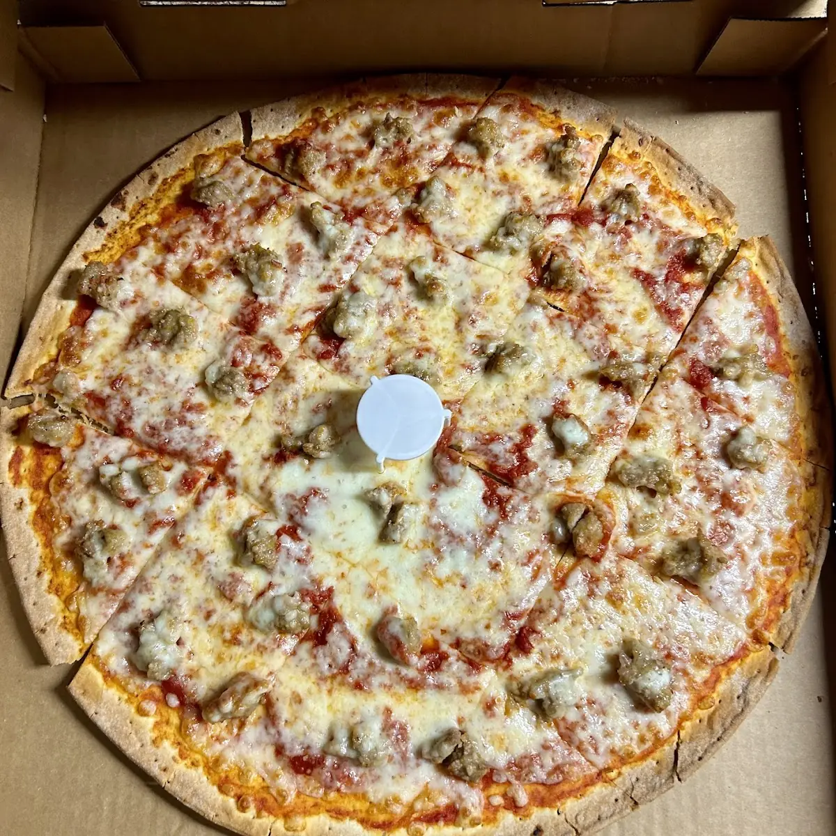 Thin Crust Cheese and Sausage Pizza