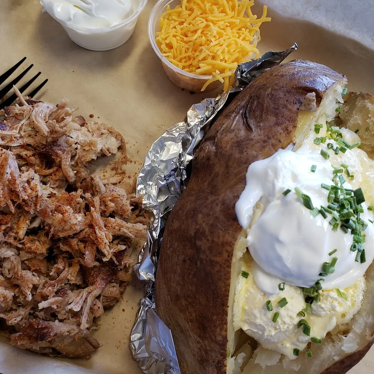 Loaded Baked Potato with Pulled Pork on the Side