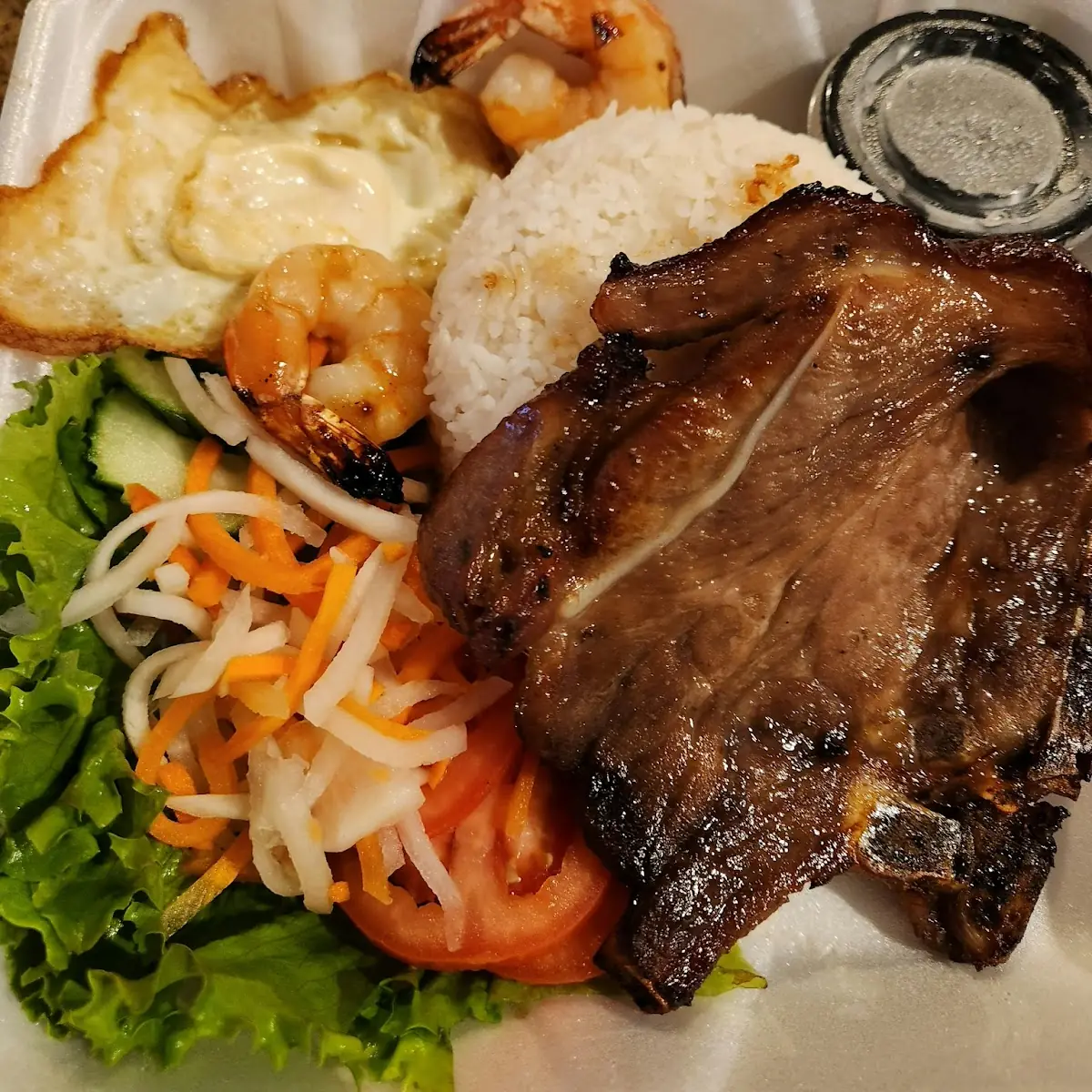 Pork Chop Shrimp Fried Egg Rice Plate