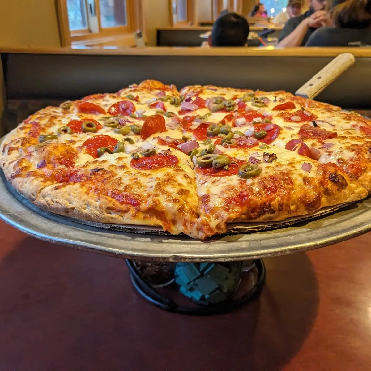 Pepperoni and Green Olive Pizza