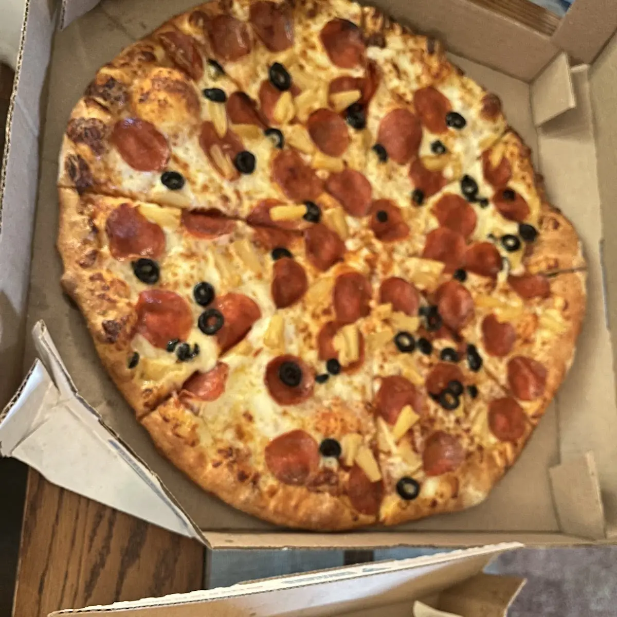 Pepperoni Black Olive Pineapple Pizza