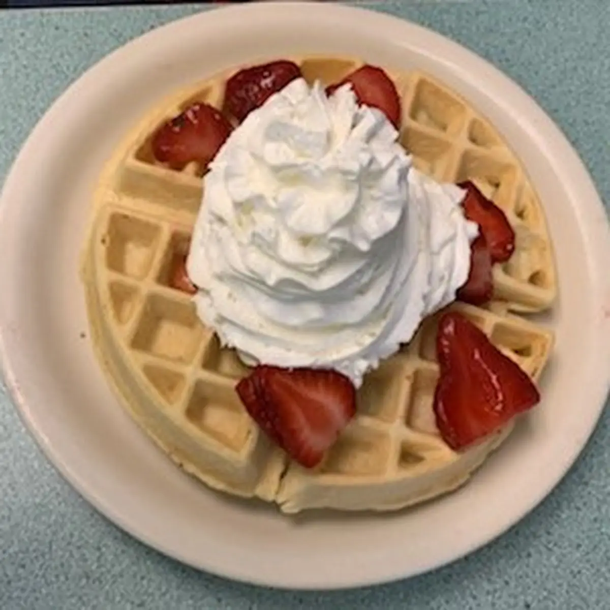 Waffle with Strawberries and Whipped Cream