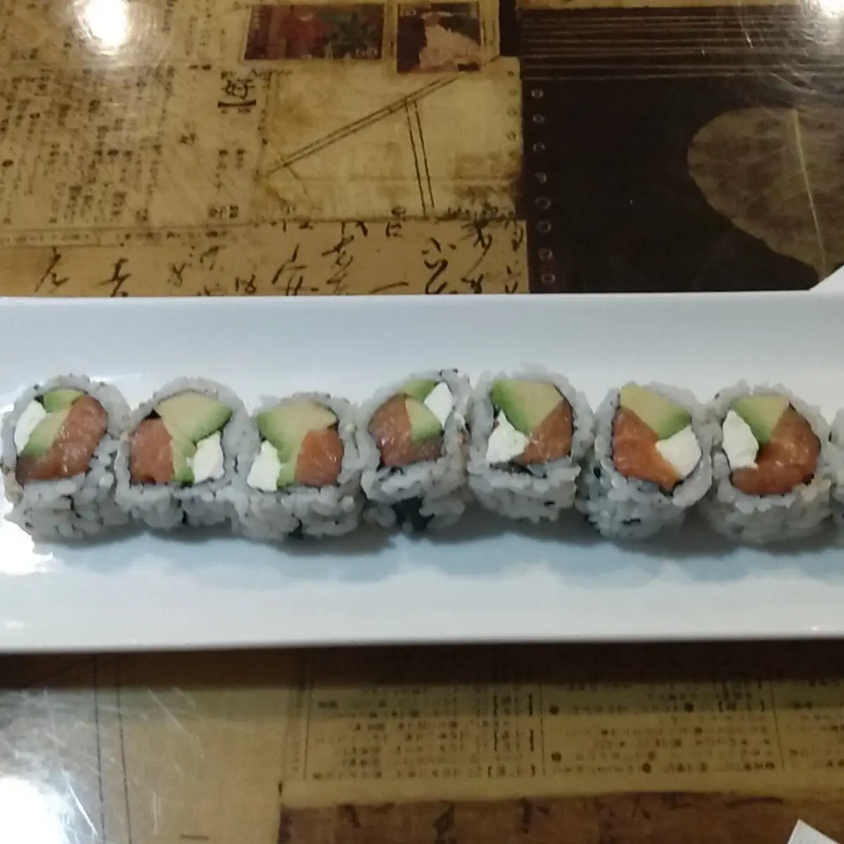 Salmon and Avocado Roll with Added in Cream Cheese