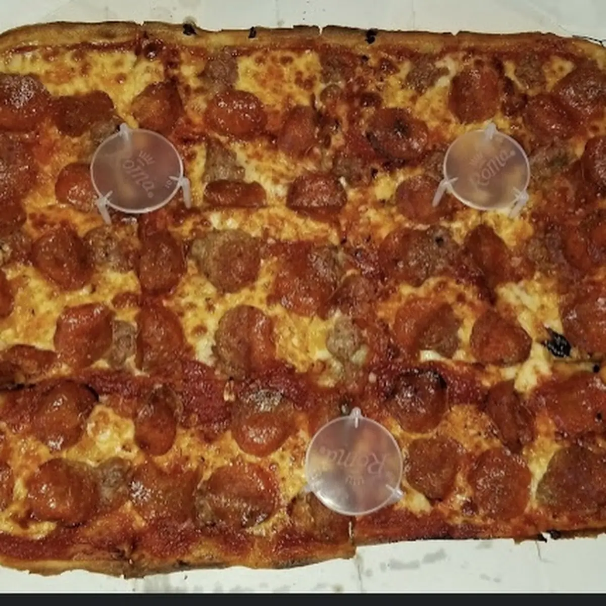 Thin Crust Cheese and Sausage Pizza