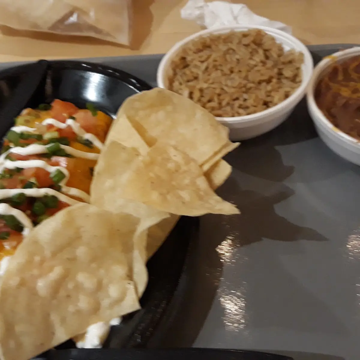 Deluxe Burrito w Rice Beans and Chips