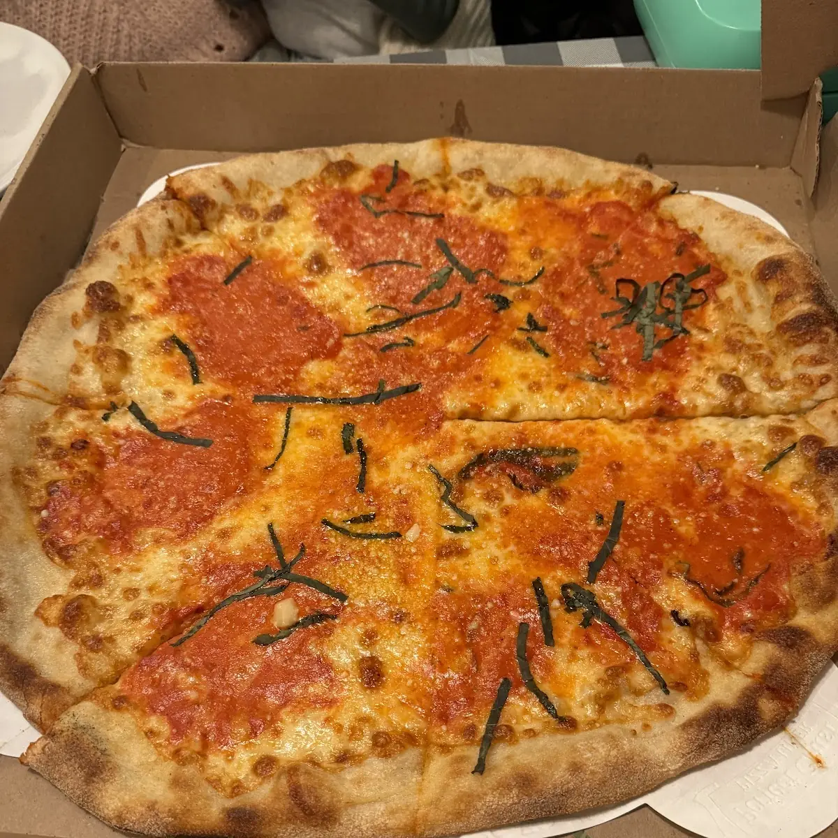 Vodka Pizza with Basil Leaves