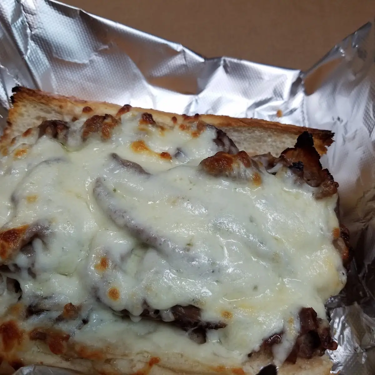 Itakian Beef with Sweet Peppers on Garlic Bread