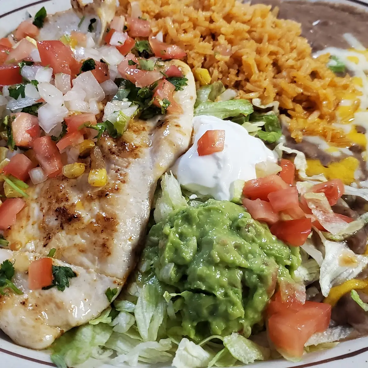 Refried Bean & Chicken Tostada