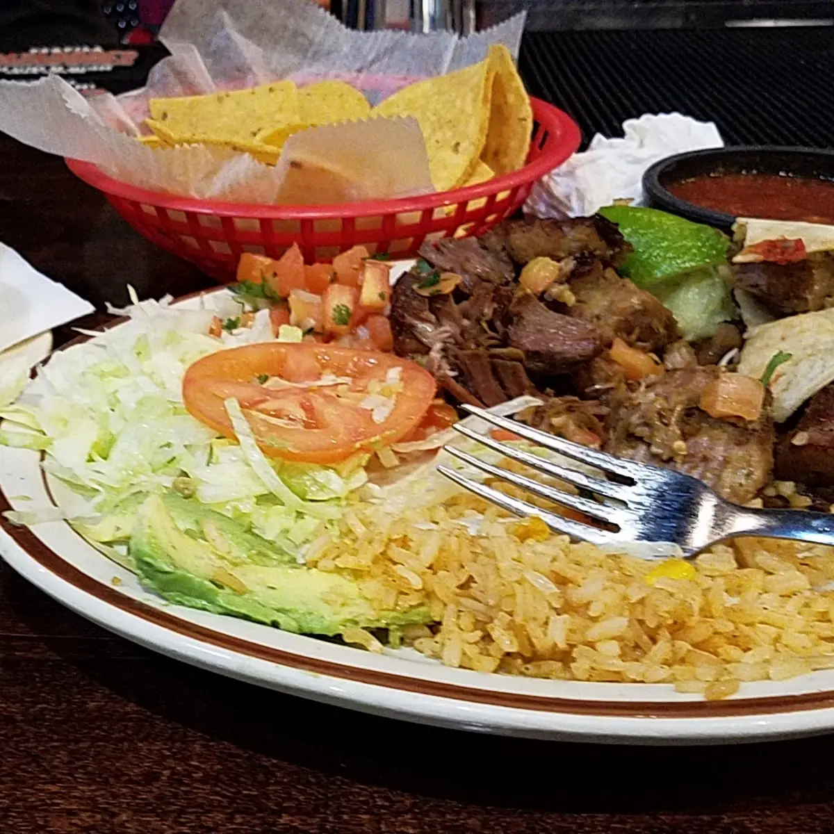 Tamales Asado Spanish Rice Refried Beans and Pico De Gallo