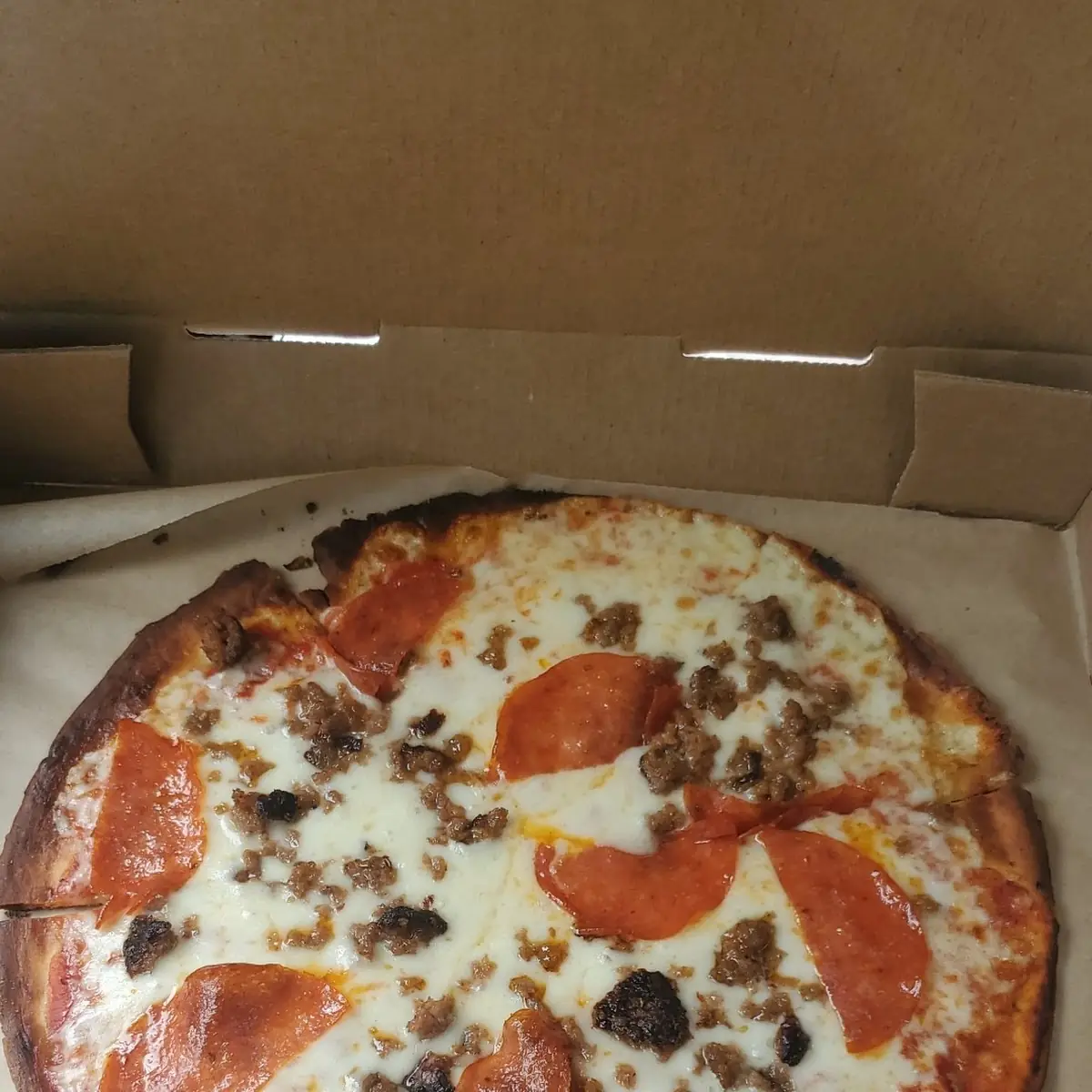 Cauliflower Pizza Pepperoni and Sausage Pizza