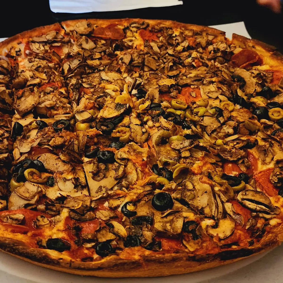 Deep Dish Mushroom and Olive Pizza
