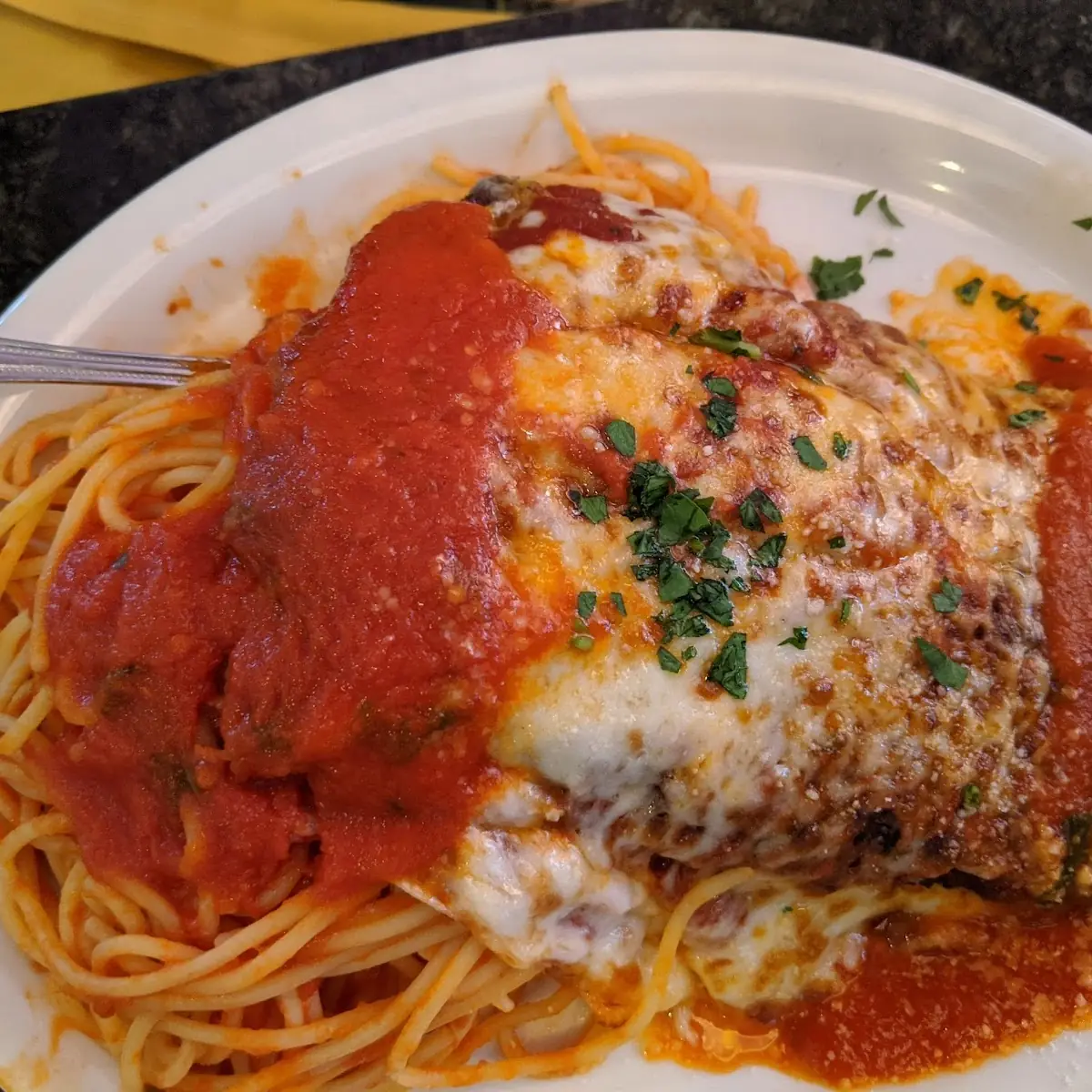 Chicken Parmesan over Spaghetti