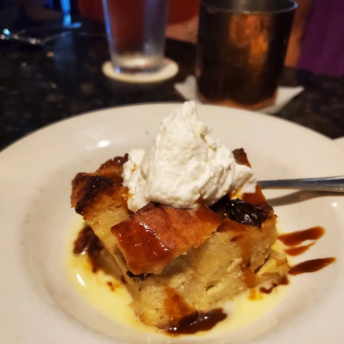 Warm Bread Pudding with Vanilla Sauce & Caramel