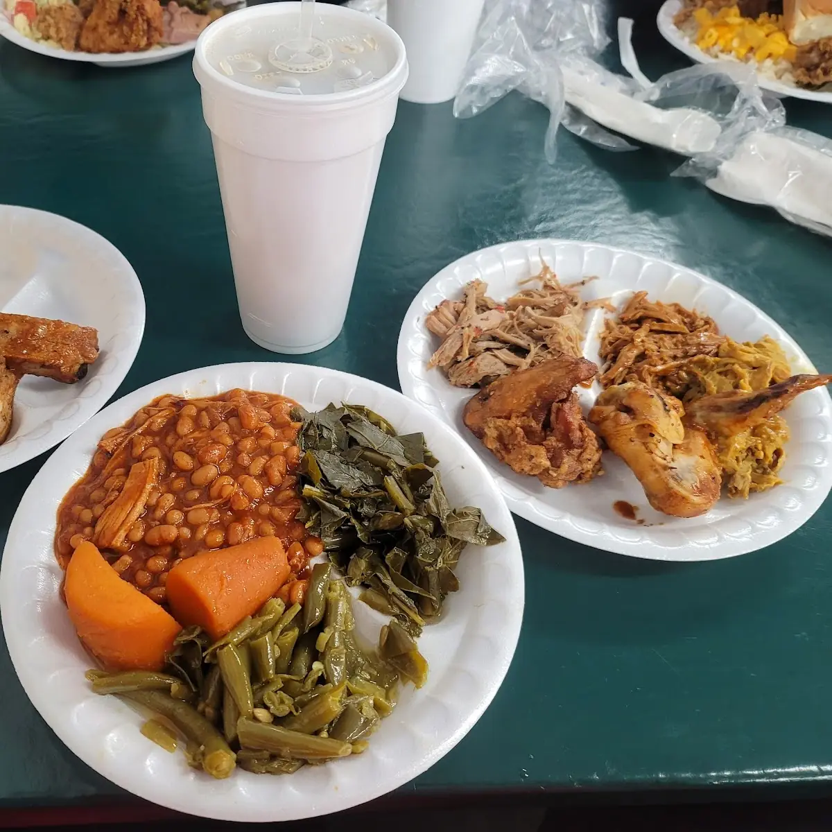 Pulled Pork Ribs Greens String Beans Fried Chicken Yams Mac and Cheese