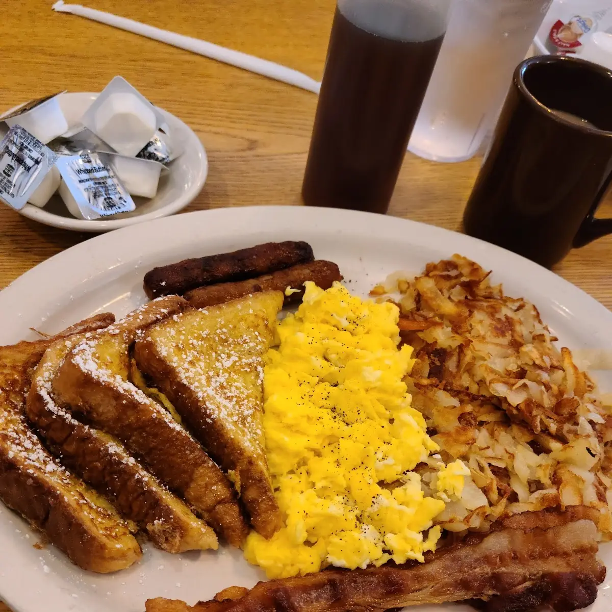 Crazy 10 with frrnch Toadt Scrambled Eggs Hash Browns and Sausage