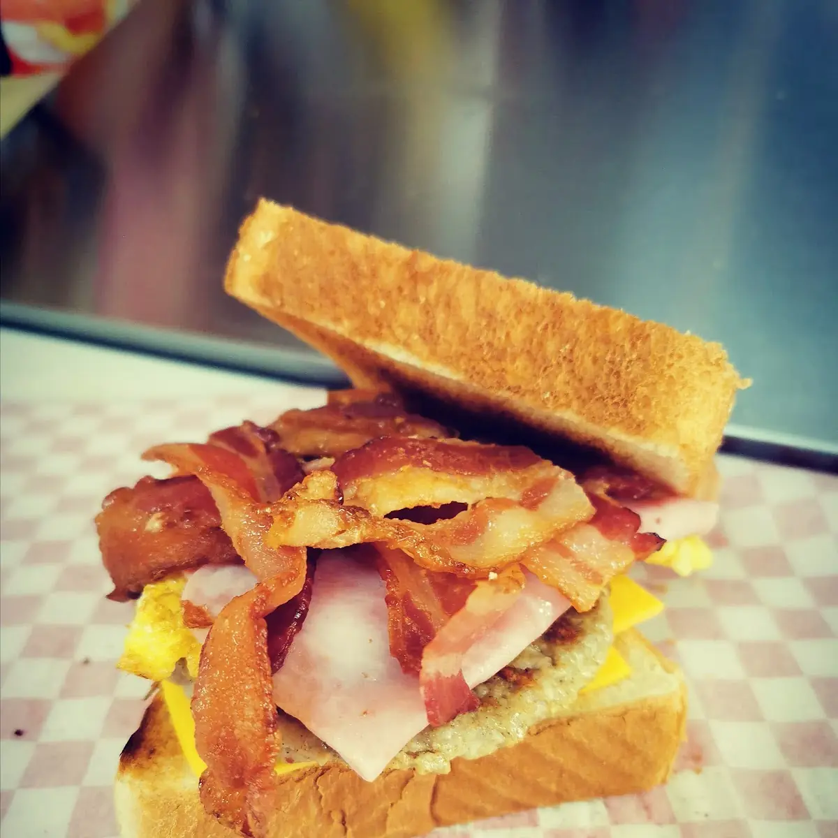 Egg Ham Bacon Sausage and Cheese Toast