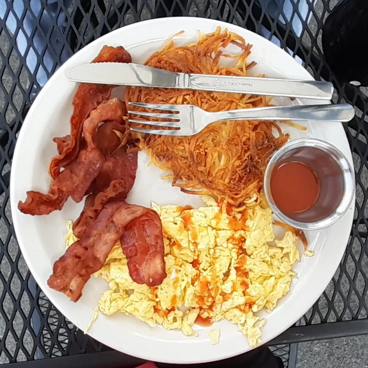 2 Eggs Scrambled Extra Crispy Bacon and Hash Browns