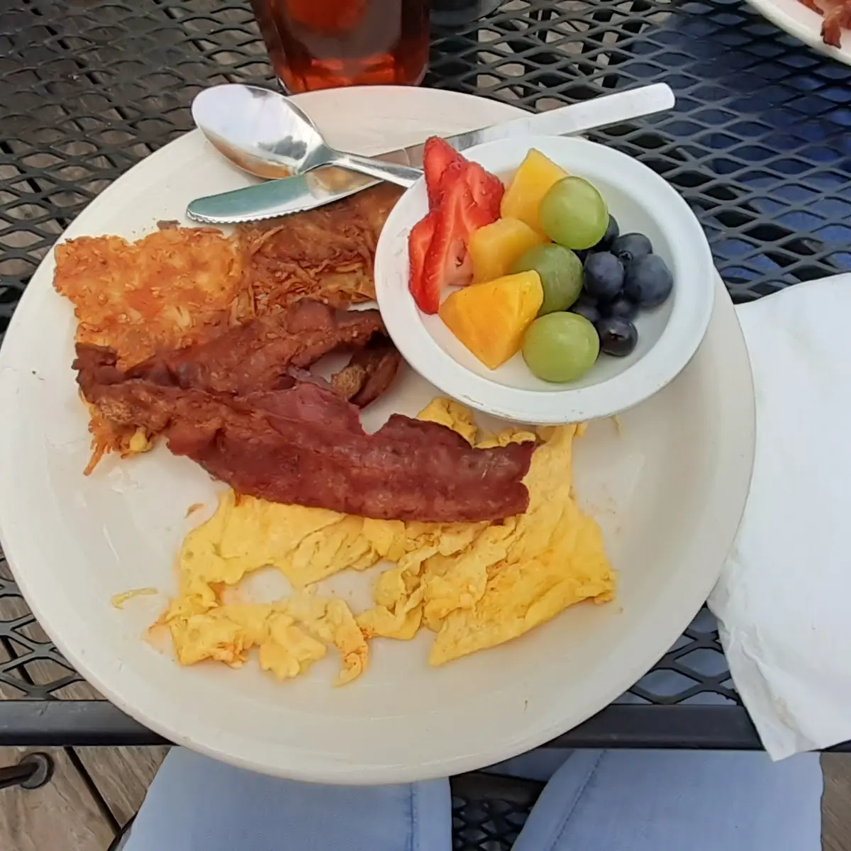 Scrambled Eggs Bacon Hash Browns and Fruit