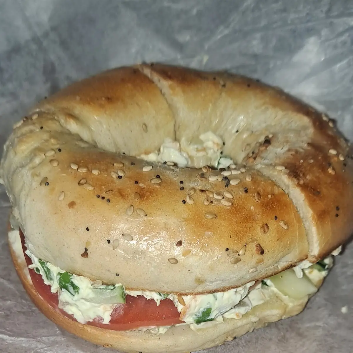 Everything Bagel with Veggie Cream Cheese Tomatoes and Cucumbers