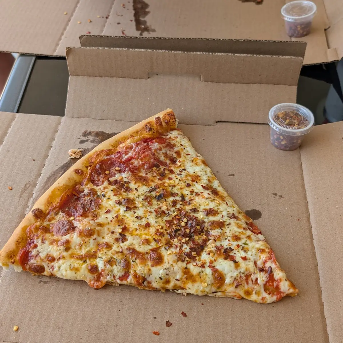 Jumbo Pizza Slice and Soda