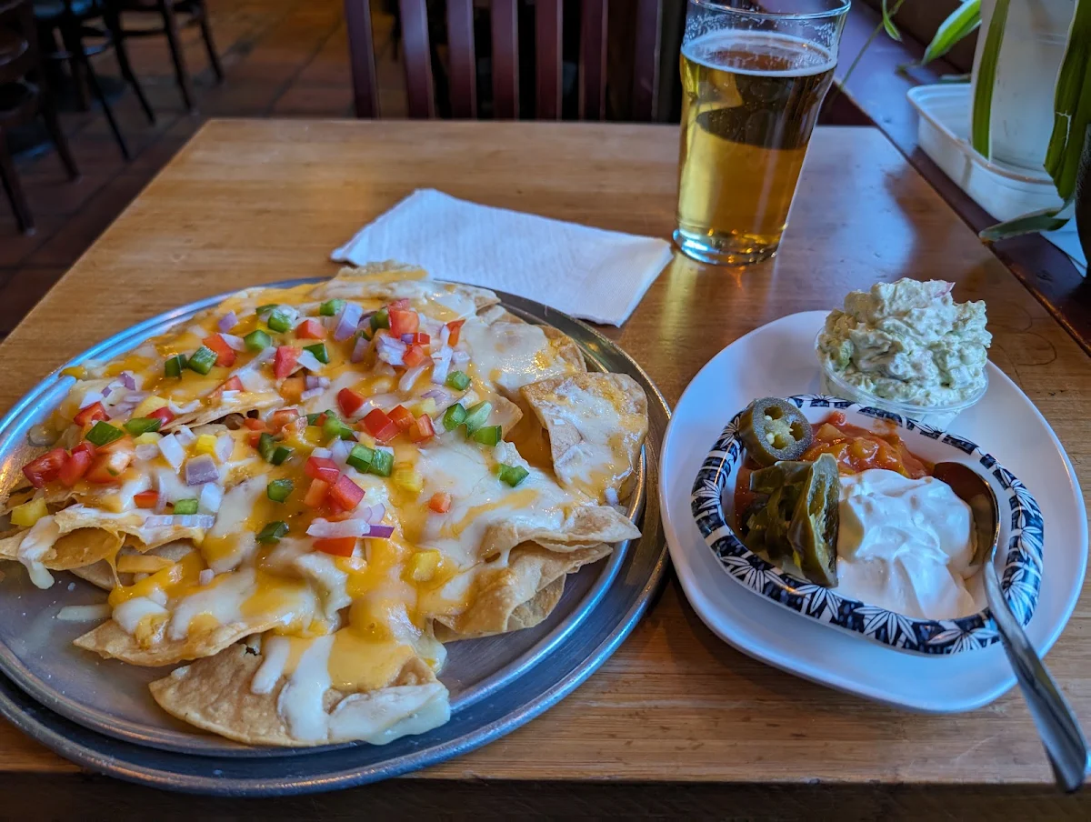 Nachos with Guacamole, Pour Boy - Manning