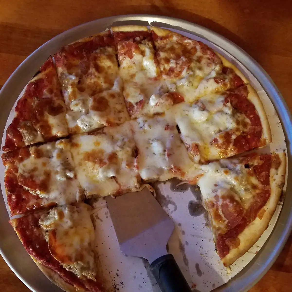 Thin Crust Pizza Sausage and Peperoni