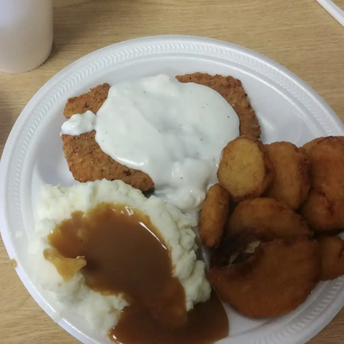 Chicken Fried Stake Fried Squash Mash Tatters and Gravy