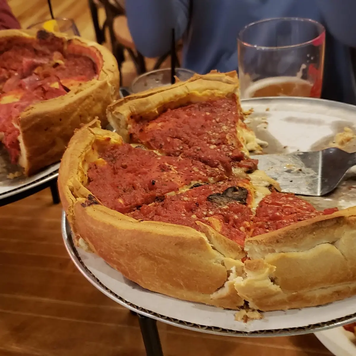 World Famous Deep Dish Pizza Peperoni Mushrooms and Black Olives