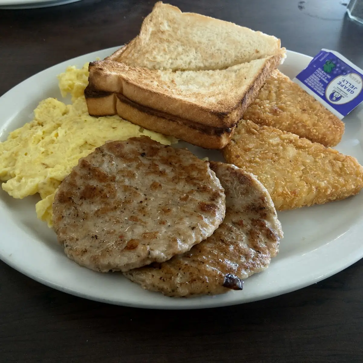 Scrambled Eggs Bacon Hash Brown and Toast