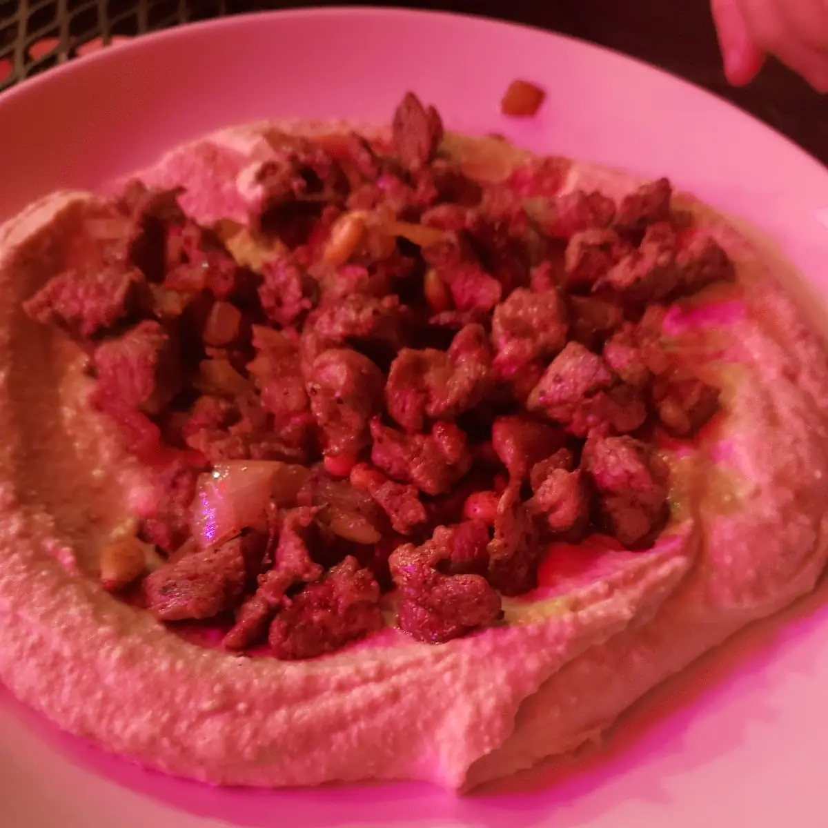 Lamb and Pine Nuts on Hummus