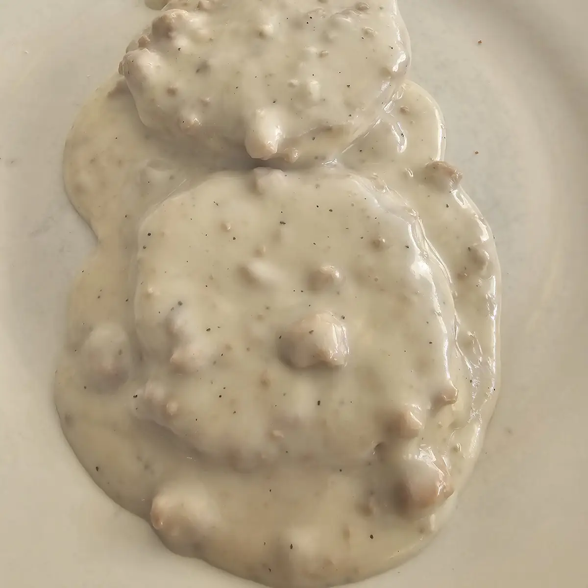 2 Biscuits & Sausage Gravy with 2 Eggs