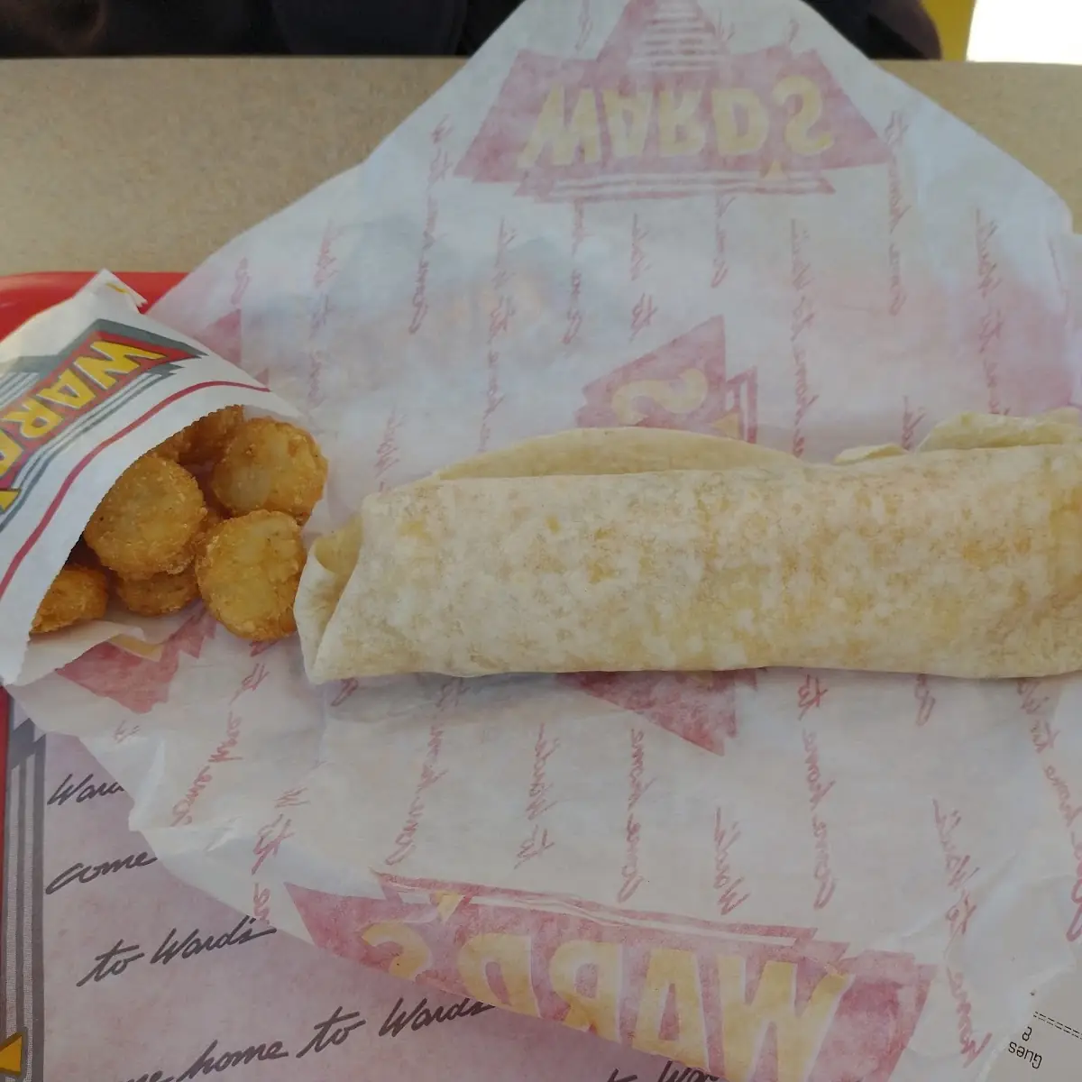 Bacon Egg and Cheese Wrap with Hashbrowns