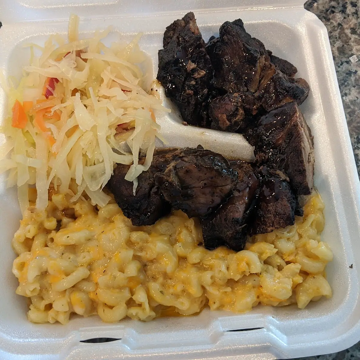 Jerk Pork with Cabbage and Mac N Cheese