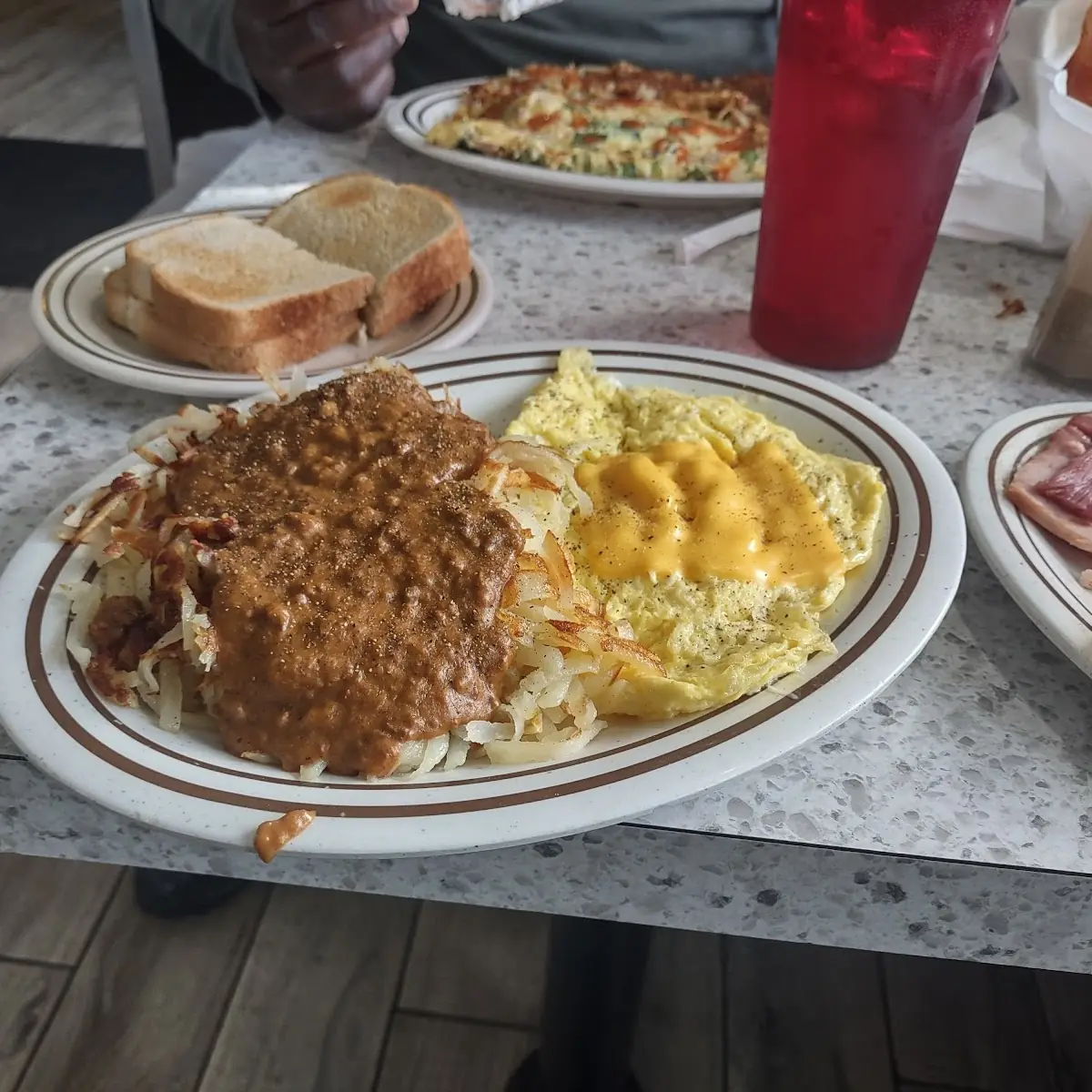 Hash Browns with Chili and Scrambled Eggs with Cheese
