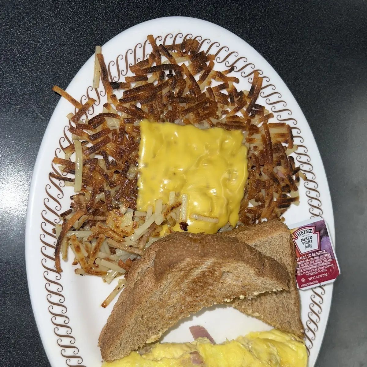 2 Eggs over Medium Hash Browns