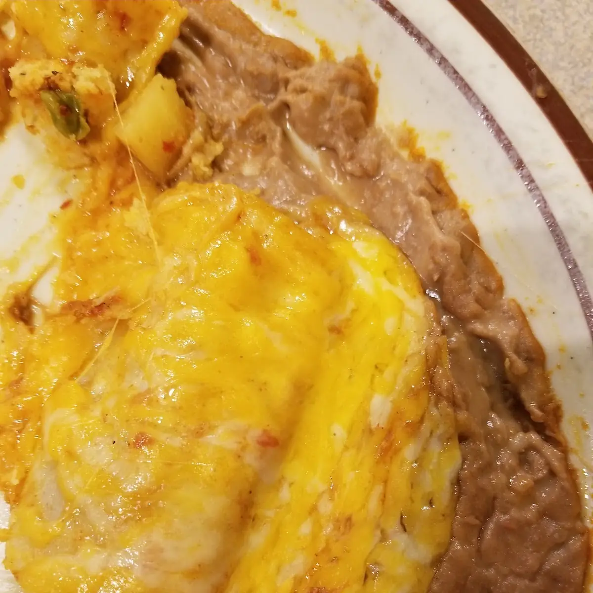 13. 1 Enchilada + 1 Beef Burrito