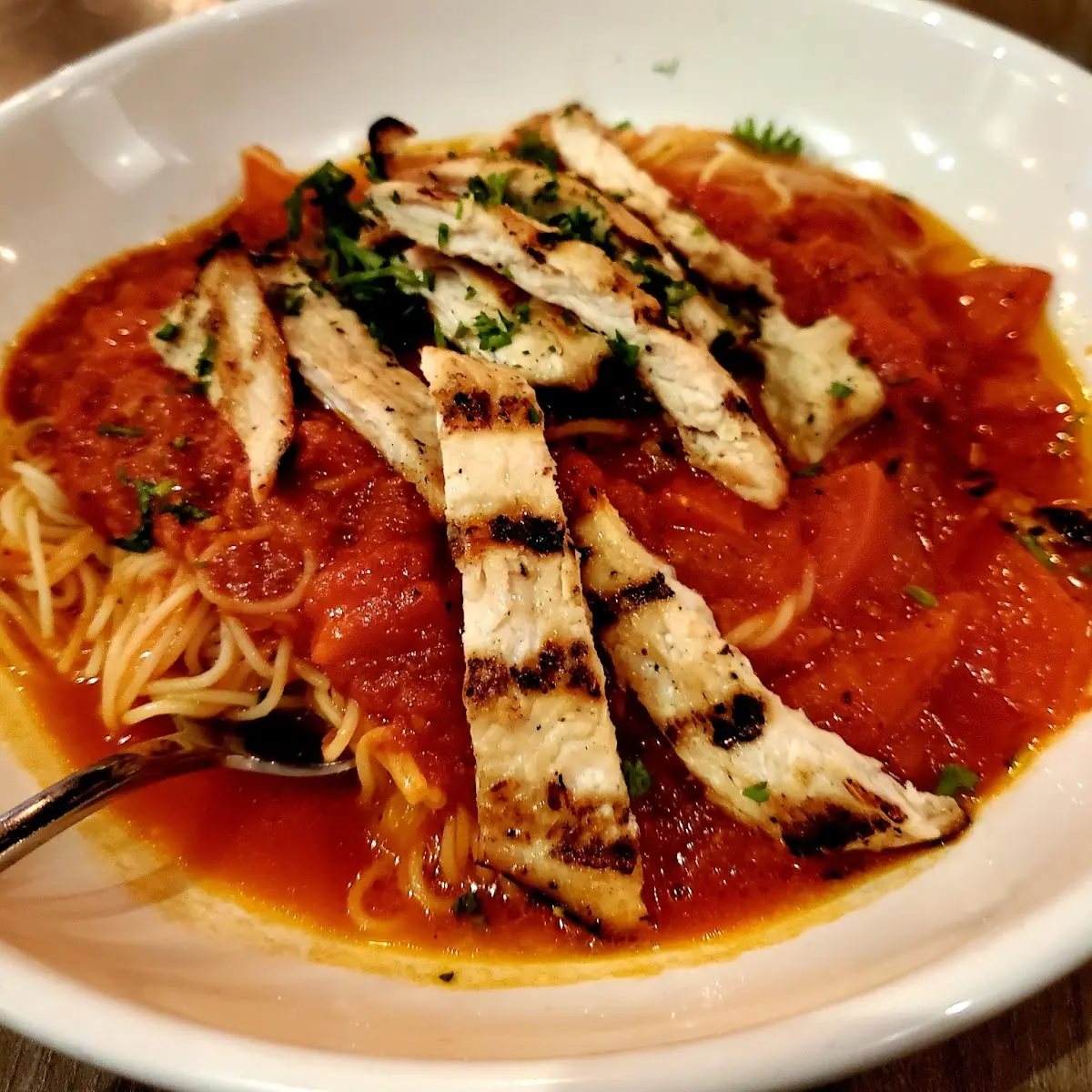Lightly Breaded Chicken Breast Mozzarella & Spaghetti with Olive Oil
