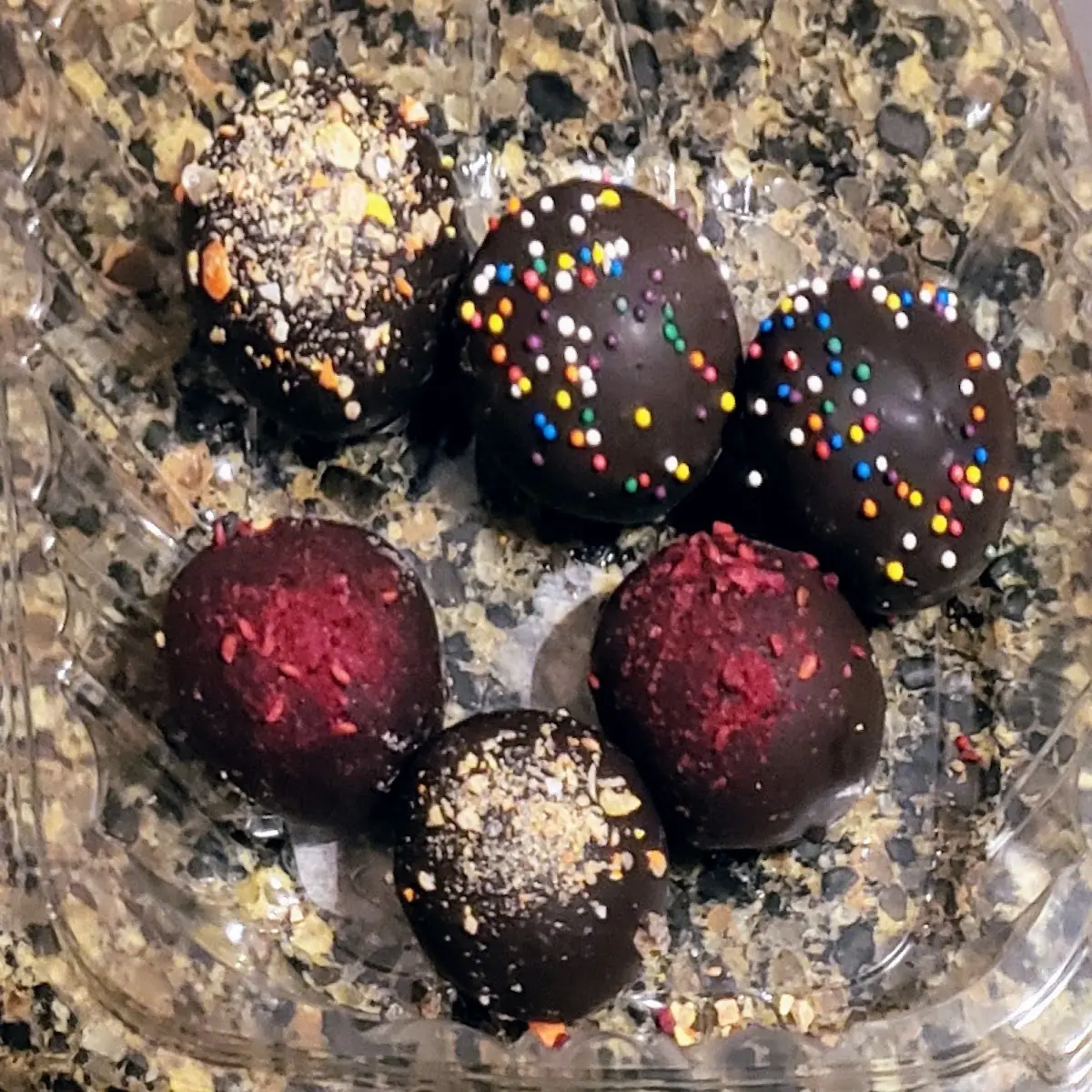 Dark Chocolate Dark Chocolate Peanut and Raspberry Cheesecake Cake Balls