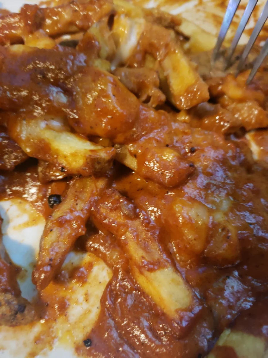 Butter Chicken Poutine, Toby's Pub & Eatery