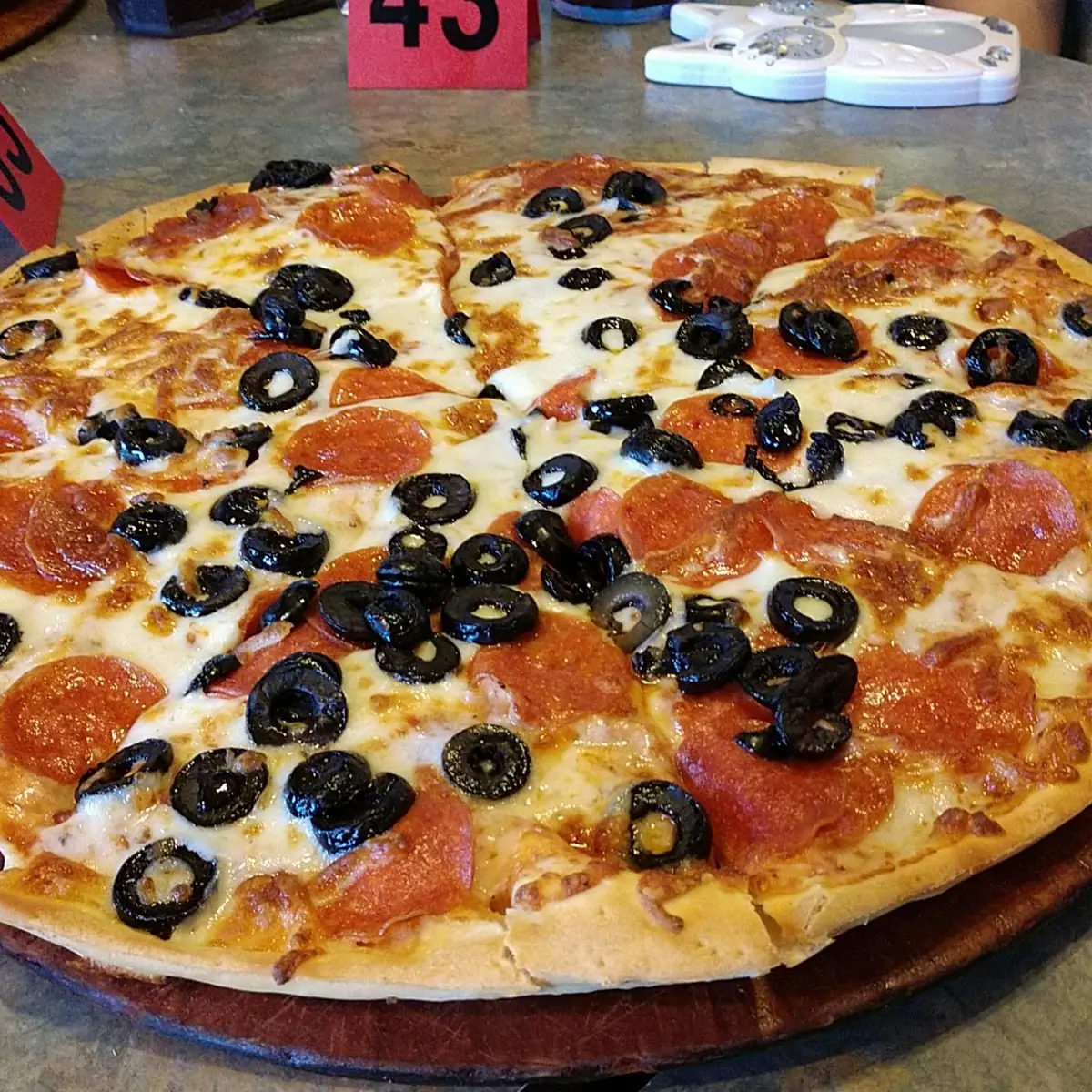 Pepperoni and Black Olive Pizza