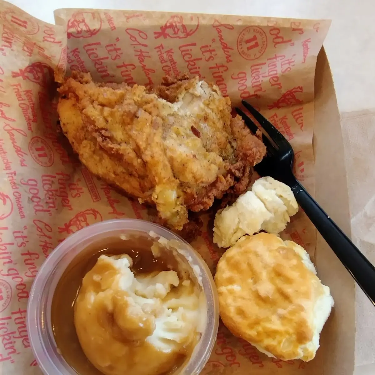 Fried Chicken with Mashed Potatoes and Biscuit