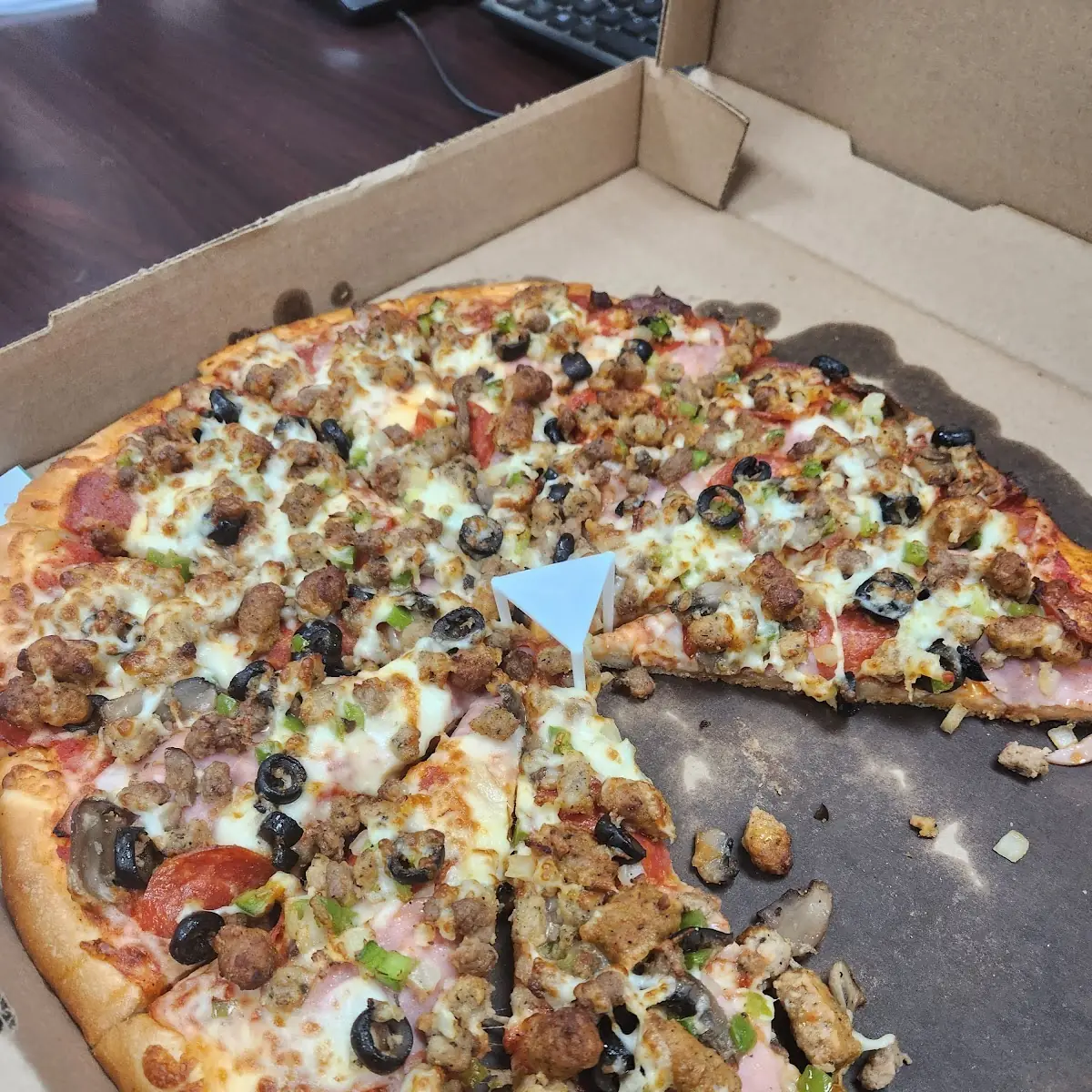 Opies Super Supreme Extra Cheese Pizza