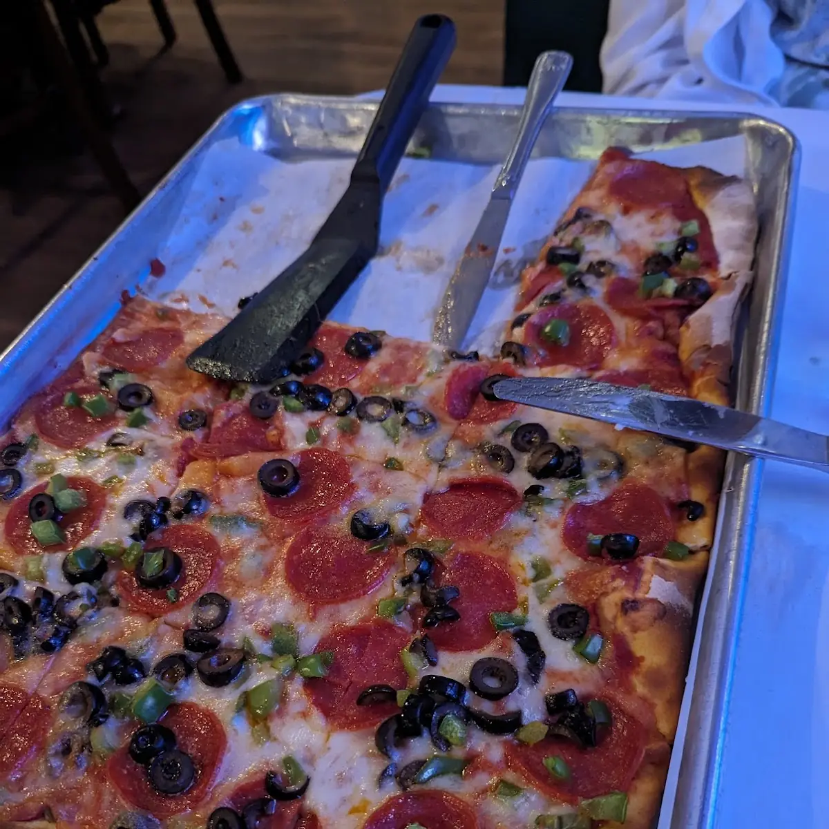 Thin Crust Pepperoni Pizza with Olives