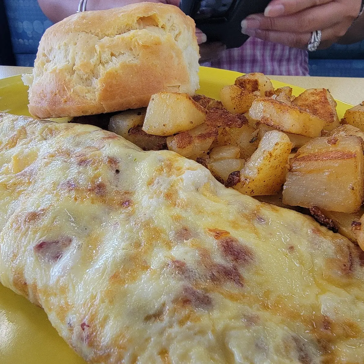 Bacon and Cheese Omelette with Home Fries and Biscuit