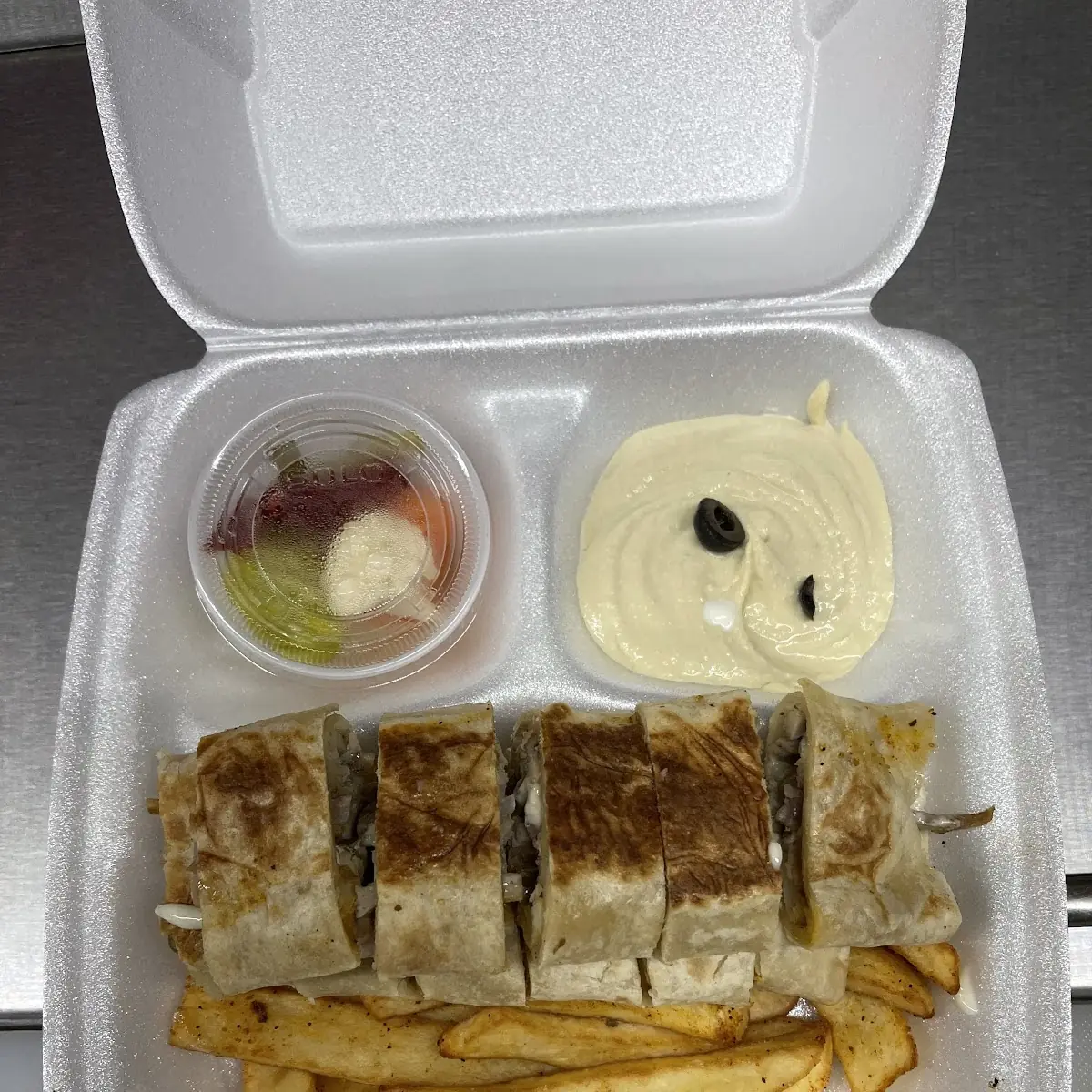 Sliced Chicken Shawarma with Hummus