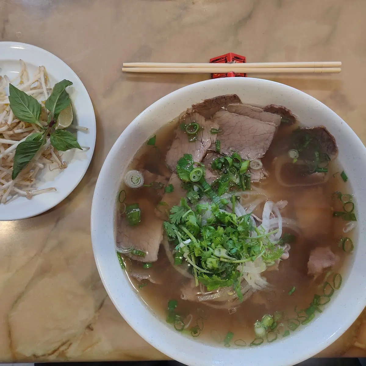 Beef Noodle Soup with Chopsticks