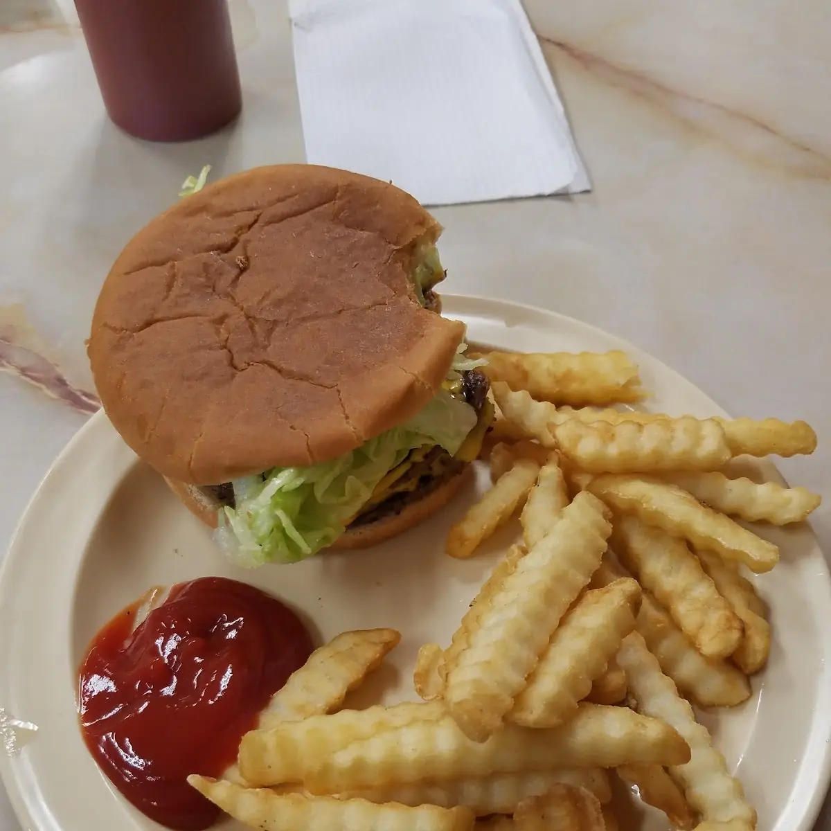 Burger and Fries with Cheesw