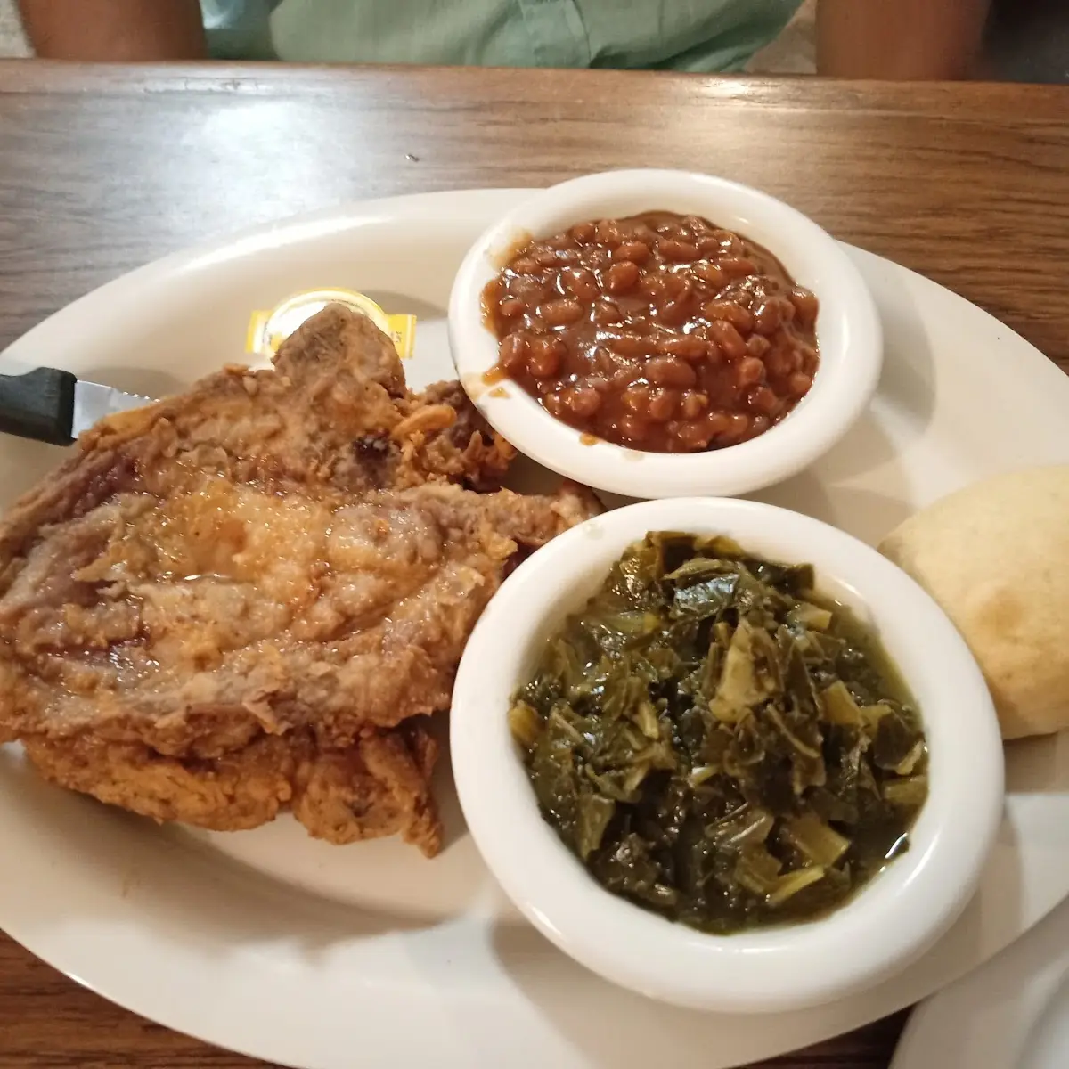Pork Chops with Baked Beans and Collard Greens