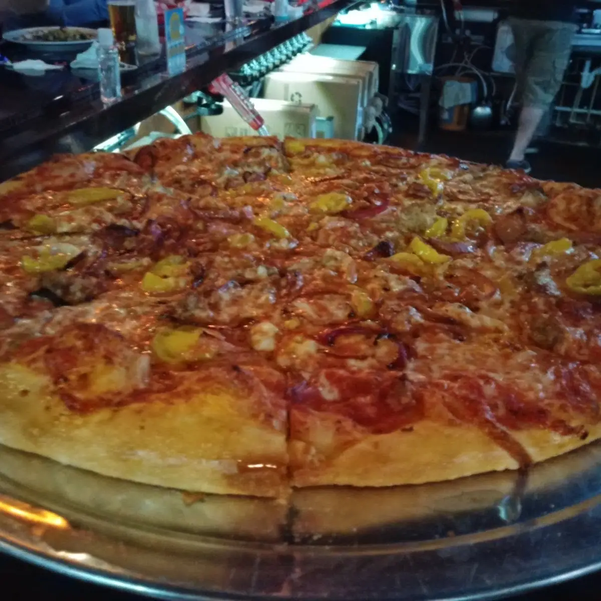 Crumbled Sausage Banana Peppers and Red Onion
